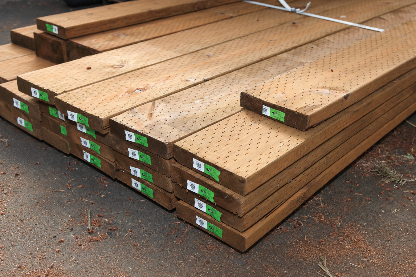 Pressure-treated wood deck construction